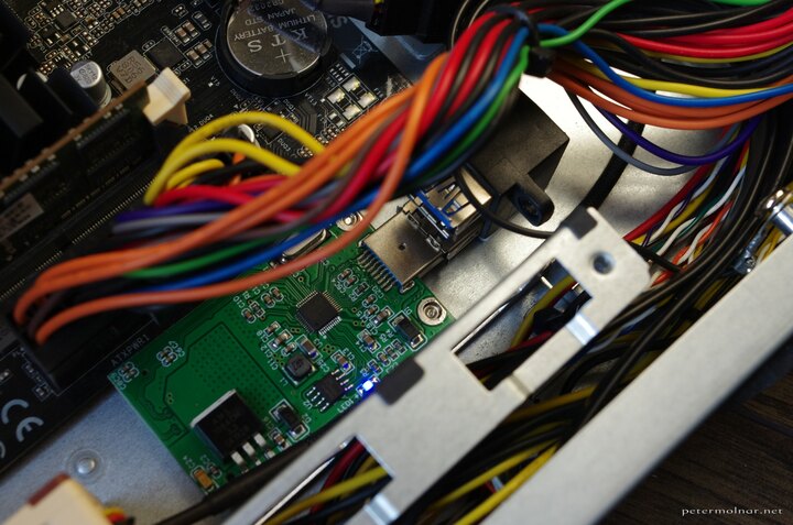 The front USB3.1 ports converted into internal ones
with an mSATA to USB converter and a 64GB mSATA SSD to RAID it with
the 64GB SATA SSD