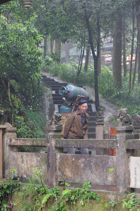 Local in Qingcheng with 2 huge gas tanks in his
back