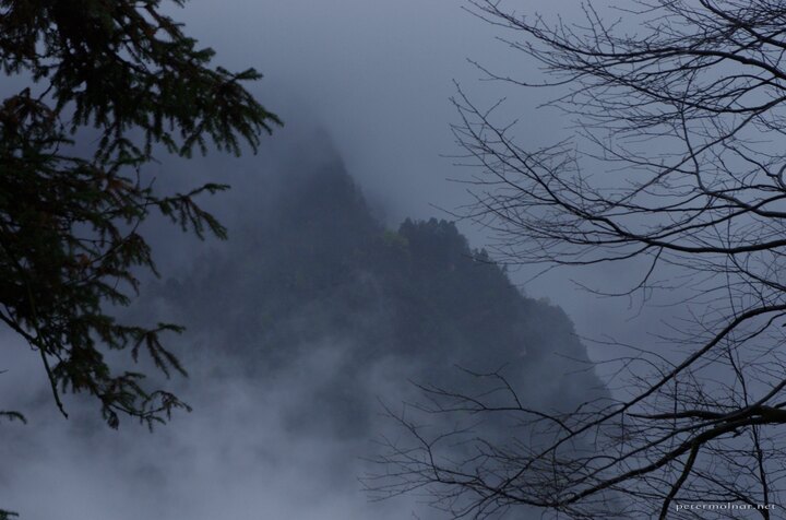 Peaks can sometimes be spotted out of the fog and the clouds at Mount
Emei