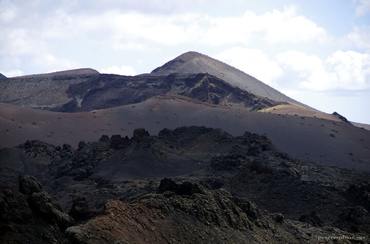 A view of volcanoes from a seat on a camel