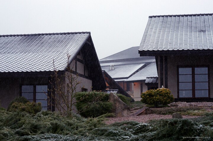 Snowy rooftops of the living accommodations at Dojo Stara Wies